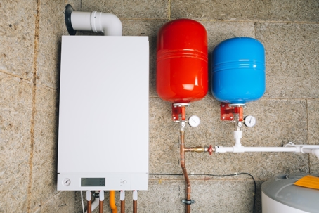 Tank and Tankless water heaters side by side